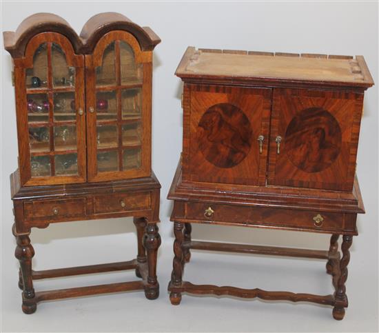 A Fergus Lane miniature Queen Anne style double dome top bookcase, 9in.